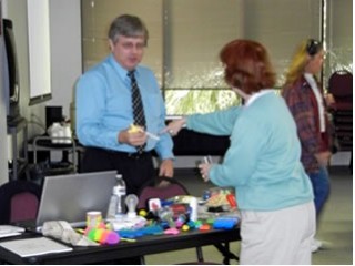 2010-12-04 Seminar--Sarasota-Steve teaching OT about fine motor items  031